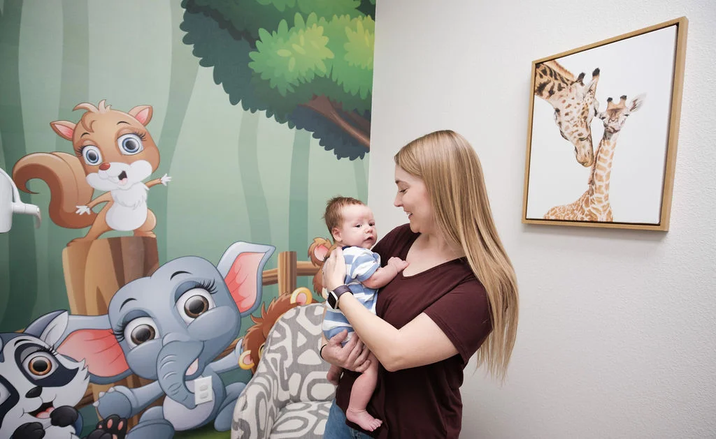 mom-with-baby-room-digital-aviator-pediatric-children's-dentistry-Watauga-TX